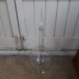A large clear glass pharmacy apothecary jar, with tear-drop stopper, overall height 81cm