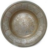 A heavy Antique Middle Eastern silver inlaid bronze dish, diameter 26cm