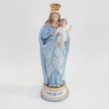 A Continental bisque porcelain group Madonna and Child, height 37cm
