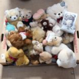 A box of small modern teddy bears