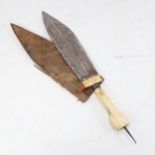 An Eastern ivory-handled dagger, with hide sheath, blade length 24cm
