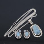 RADNIOVICH - a sterling silver and blue stone set pair of earrings, and a similar silver and stone