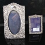2 rectangular silver-fronted photo frames
