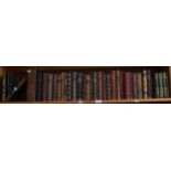 A shelf of leather-bound hardback books, including Smith Brambletye House, Oliver Goldsmith, Jack'