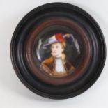 A miniature hand painted porcelain panel, depicting head and shoulders portrait of lady, framed,