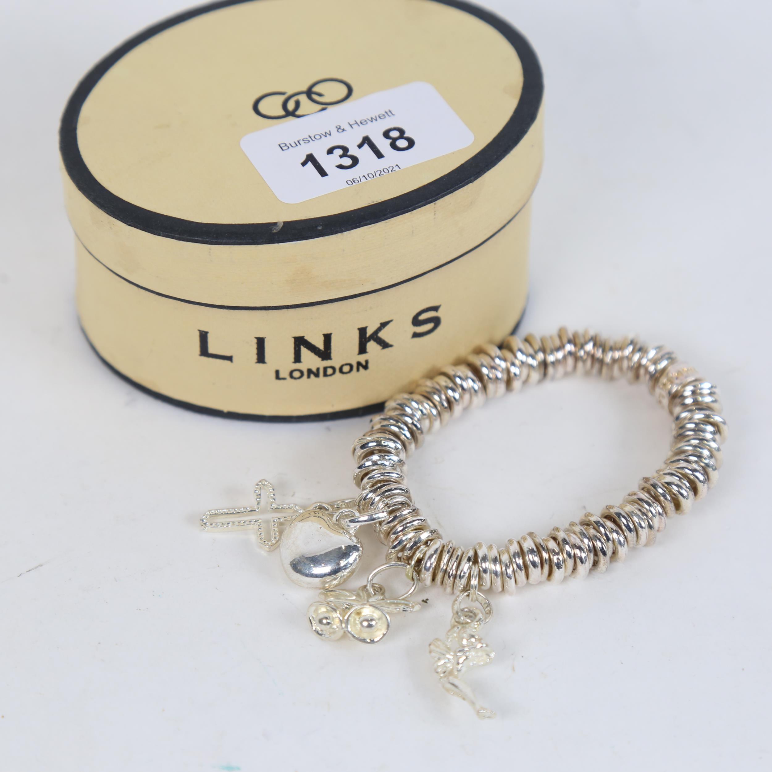 LINKS OF LONDON - a novelty charm bracelet, in original box