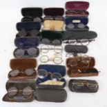 A collection of 18th and 19th century spectacles in original cases, including domed magnifying