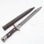 A First World War Period bayonet and scabbard, blade length 25cm