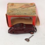 A Vintage tinplate clockwork Schuco Commando Anno 2000 toy saloon car, boxed