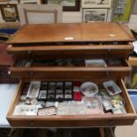 An Antique table-top mahogany collector's cabinet of 6 graduated drawers, with brass knobs,