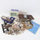 A large collection of British and foreign coins, including commemorative and pre-decimal, and