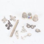 A floral enamelled thimble, 2 other silver thimbles, a tie pin, pendants etc