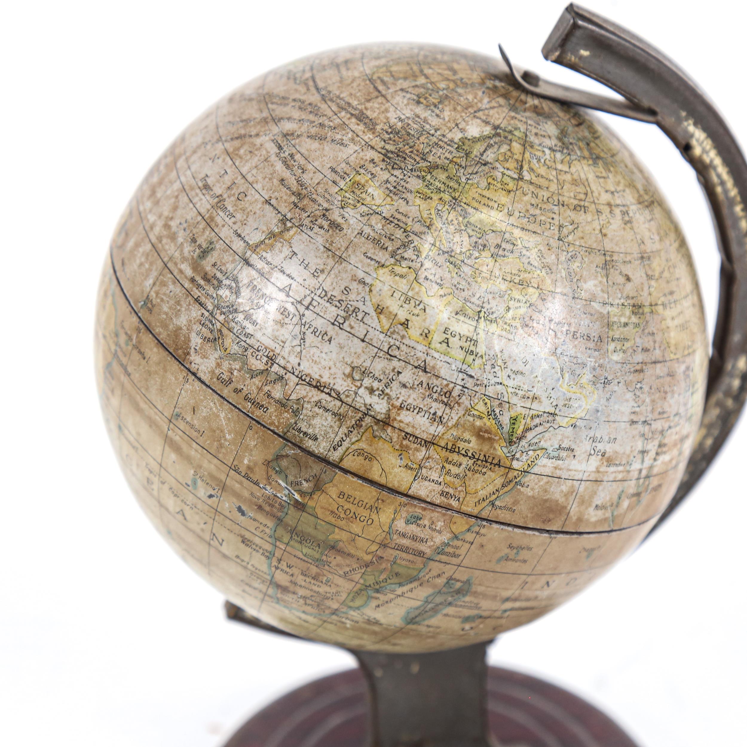 A Vintage Chad Valley tinplate desk-top terrestrial globe, height 20cm - Image 2 of 2