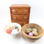 A pine table-top chest of 3 drawers, with turned wood handles, height 36cm, and 2 bowls containing