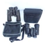 A pair of Minolta standard XL 12x50 wide angle binoculars, and a pair of Mead 10x50 binoculars.