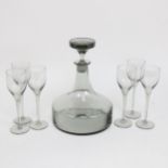 A Whitefriars grey glass decanter and stopper, and 6 matching goblets