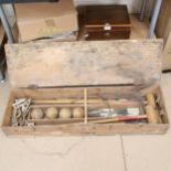 A Vintage French croquet set, with Jeu De Croquet label, in pine case