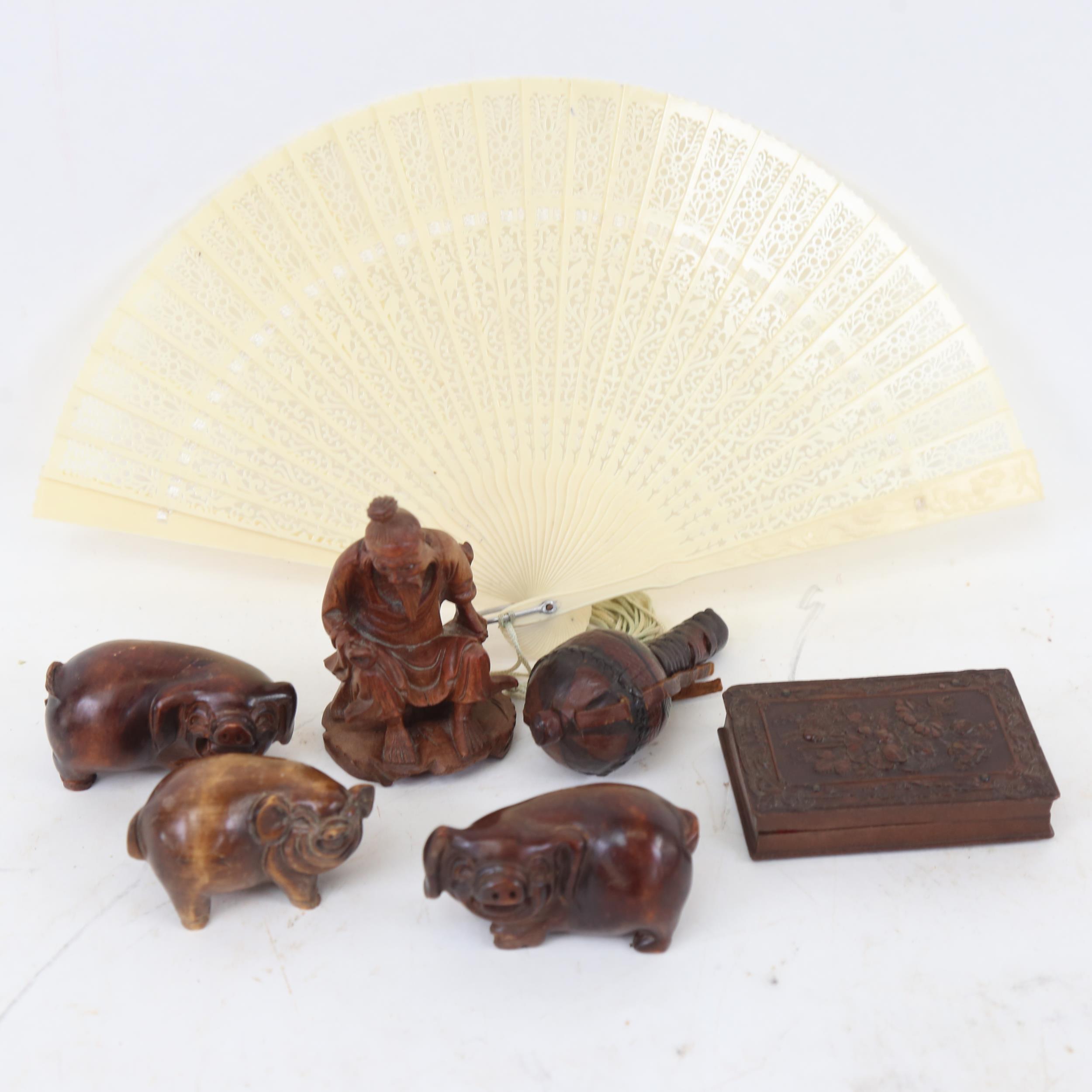 Various Oriental items, including carved wood pig netsuke, seated elder figure etc