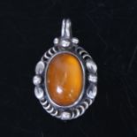 GEORG JENSEN - a Vintage Danish sterling silver and amber drop pendant, boxed