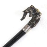 A Victorian ebonised walking cane, with silver collar and reproduction brass hunting dog and