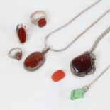 A group of silver stone set jewellery, to include 2 rings, a pendant and chains, and cornelian