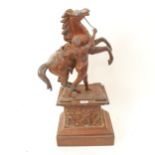 A patinated spelter Marley horse group on plinth, 44cm