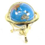 A reproduction brass and hardstone table-top terrestrial globe, with compass inset base, overall