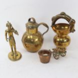 A brass Guernsey milk jug, 18cm, a brass figure, nesting pair of 19th century apothecary's