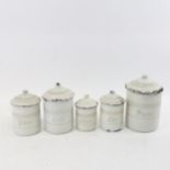 A 19th century French enamelled kitchen storage jar set, largest height 20cm