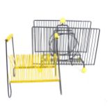 A retro mid-century Atomic style wirework and yellow plastic magazine rack, and a similar letter
