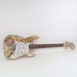 An electric guitar, with London Underground design