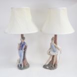 A pair of NAO porcelain table lamps with shades, height 59cm overall
