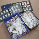 A large quantity of various loose cigarette cards, including Player's and Wills's (2 boxes)
