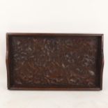 An Indian carved and stained hardwood grapevine tea tray, 54cm x 32cm