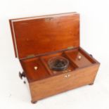An unusual Victorian mahogany double-compartment sarcophagus tea caddy, top layer concealing