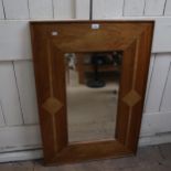 A large inlaid specimen wood rectangular bevel-edge wall mirror, overall 110cm x 70cm
