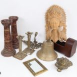 A Bethune military bell, height 17cm, a brass door knocker, candlesticks, a photo frame etc