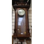 A Vienna regulator wall clock, in ornate mahogany case, with enamel dial, height approx 120cm