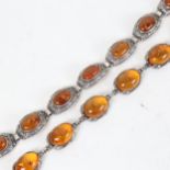 2 silver and oval Baltic amber panel bracelets