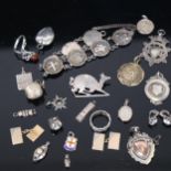 A Chinese circular disc panel bracelet, silver fobs, brooches etc