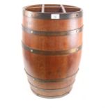 A coopered oak barrel stick stand, with removeable 6-section insert, height 61cm