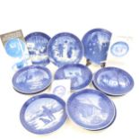 11 Royal Copenhagen Christmas plates, with booklets