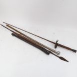 An Oriental bamboo swagger stick, ebony truncheon, fencing foil, and double-ended spear (4)