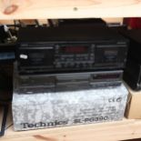 Vintage stacking Hi-Fi, comprising Denon double-cassette deck DRW-580, and Technics compact disc