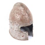 A replica barbute 15th century helmet