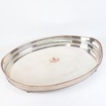 An oval silver plate on copper galleried tea tray, length 61cm