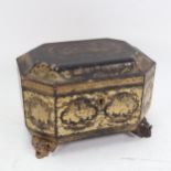 A 19th century Chinese chinoiserie gilded black lacquer casket, with sectioned interior, on gilded