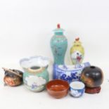 Various Oriental ceramics, including a Chinese turquoise ground vase and cover, with figure