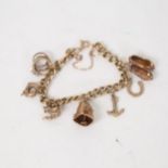 A 9ct gold charm bracelet and charms, 35g