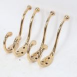 A set of 4 large and heavy Antique bronze hat and coat hooks, height 18cm